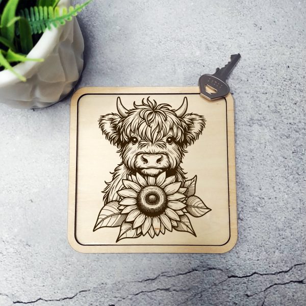 Highland Cow Holding Sunflower Laser SVG Design Element - Image 2